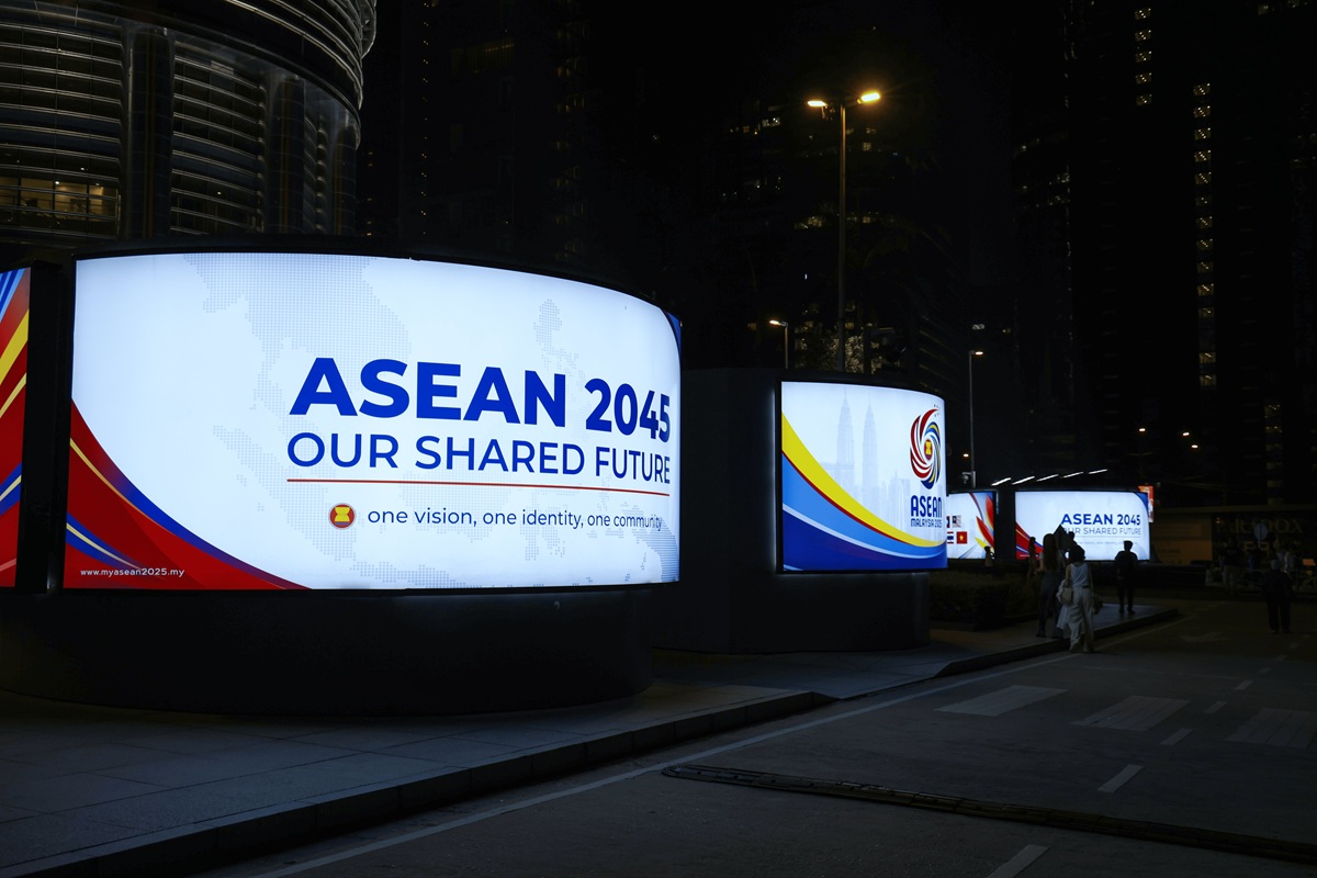 ASEAN 2045 billboard screens glowing at night